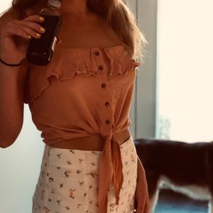 Pink frilled tank top with bottom tie